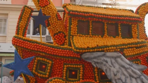 Incredible ship float made with citrus fruits in French parade Video stock 331164148