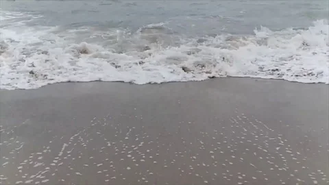 Incredible slowmo on the beach Stockbeeldmateriaal 89560494