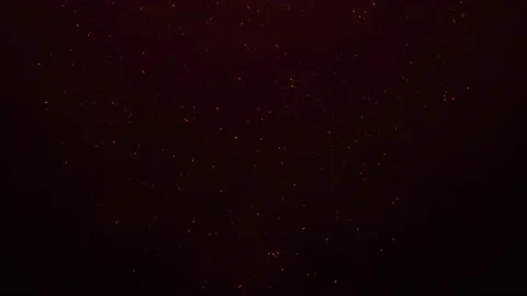 Incredible Stardust Tiny Burning Real Sparks Flame Particles Breaking Out On Video stock 199403285