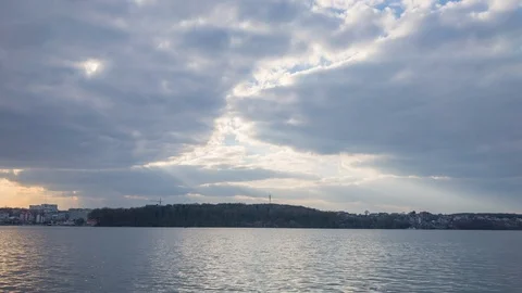 Incredible sun rays moving over city lake landscape. Time lapse Stock Footage 104959469
