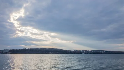 Incredible sun rays moving over city lake landscape. Time lapse 스톡 동영상 104959848