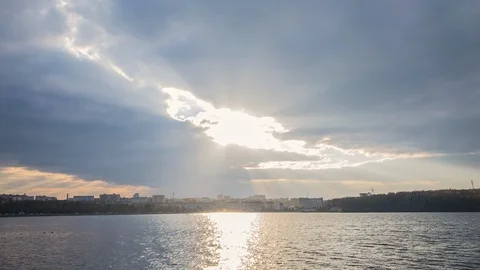 Incredible sun rays moving over city lake landscape. Time lapse Stock Footage 104960278