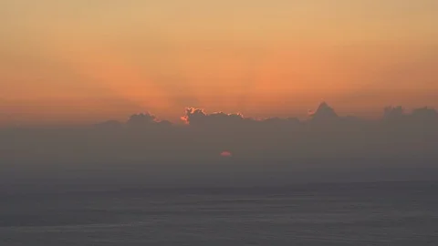 Incredible sunset light rays of the sun on the water with clouds in Crete Greece Stock Footage 97851386