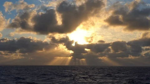 Incredible sunset in the open ocean 4K. cloudy sky at sunset Stock Footage 124778199