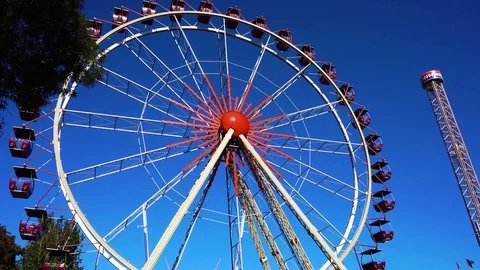 Incredible time lapse low angle view on big ferris wheel spinning ride at roller Stock-Footage 98406222