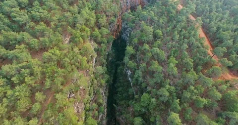 Incredible Valley Formation Inside Forest, Top Aerial View Stock Footage 147067035