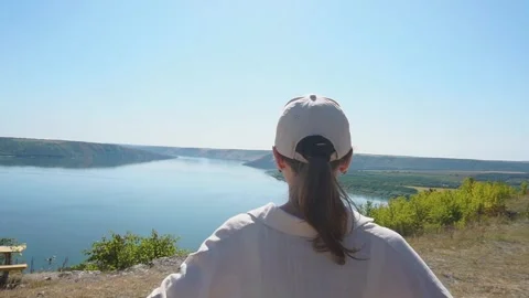 Incredible view of the canyon with the river behind the girl Stock Footage 255459512