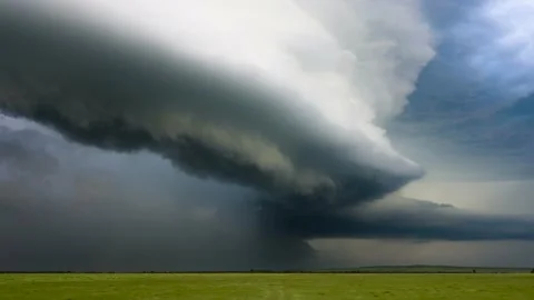 Incredible View of A Powerful Storm Drifting Across the Beautiful Open Plains Stock Footage 235435987