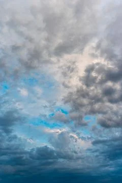Incredibly beautiful clouds with a blue gap Stock Photos