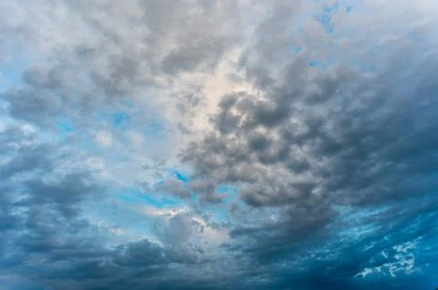 Incredibly beautiful clouds with a blue gap Stock Photos