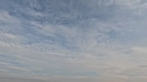 Incredibly beautiful cumulus textured clouds under blue sky Stock Footage 308391613
