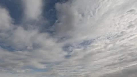 Incredibly beautiful cumulus textured clouds slowly moves under blue sky Stock Footage 318097564