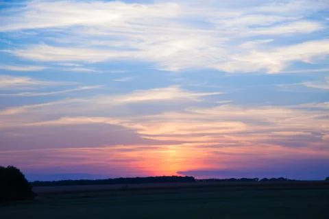 Incredibly beautiful sunset, clouds at sunset, colorful sunset Stock Photos