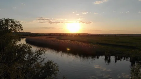 Incredibly beautiful sunset over the river and the valley Stock Footage 106340707