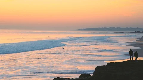 Incredibly beautiful sunset sky reflections on the atlantic ocean waves at Ca 動画素材 108906954