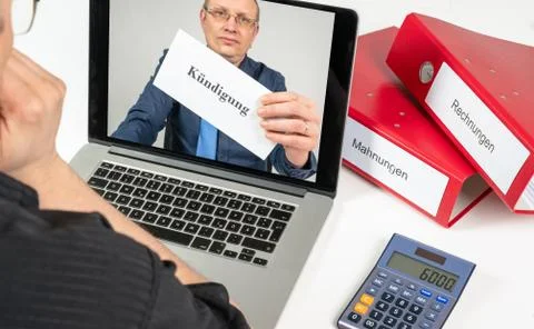 Indebted man gets his termination online Stock Photos