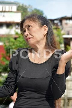 Indecisive Female Senior Gramma Stock Photos