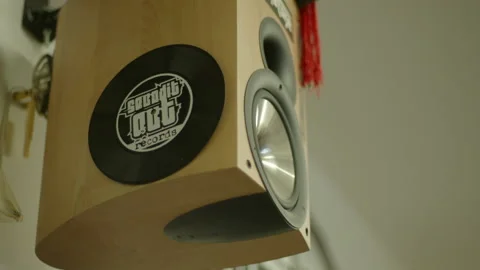 Independant Record Store Wall Speaker with 'Sound It Out' Sticker on the Side. Vídeos de archivo 136555331