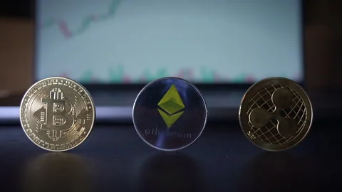 An InDepth Analysis of the Cryptocurrency Market Using Physical Coins as a Stock Footage 295900538