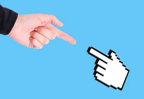 Index Finger and Mouse Pointer Reaching Towards Each Other Stock Photos