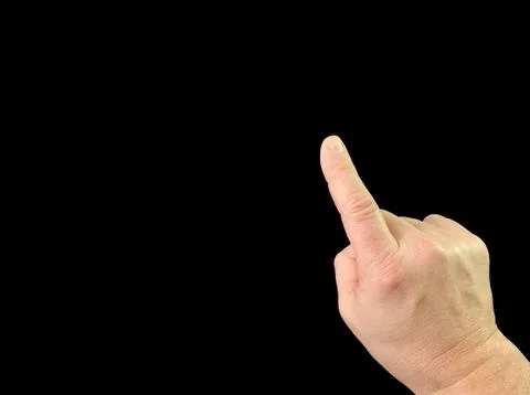 The index finger pushes the button from the inside. Finger touch to switch in Stock Photos