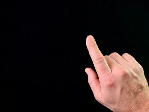 The index finger pushes the button from the inside. Finger touch to switch in Stock Photos