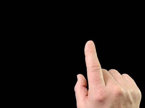 The index finger pushes the button from the inside. Finger touch to switch in Stock Photos