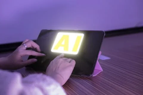 Index finger touching tablet screen with AI processor generator of intellig.. Stock Photos