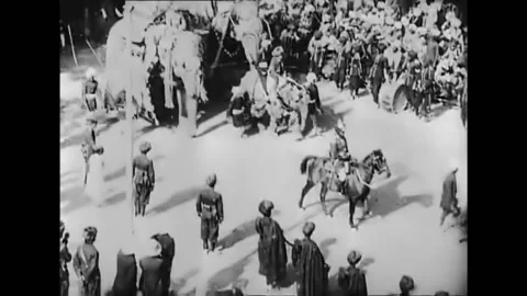 INDIA - 1903 - Elephants are ridden two-by-two or in single file during the Vidéo 254194470