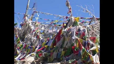 INDIA - 1999 - Close-up of prayer flags rustling in the breeze in India's Stock Footage 341673273