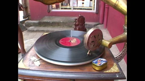INDIA - 1999 - Close-up of a record as it spins around a phonograph in Kochi, Stock Footage 284462288