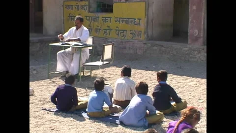 INDIA - 1999 - Young students are taught outdoors in rural India. Video stock 327373480