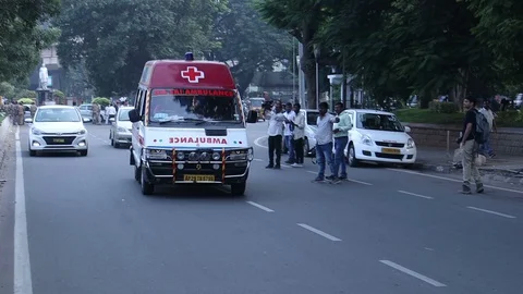 India-ambulance-passing-by Stock Footage 119487210