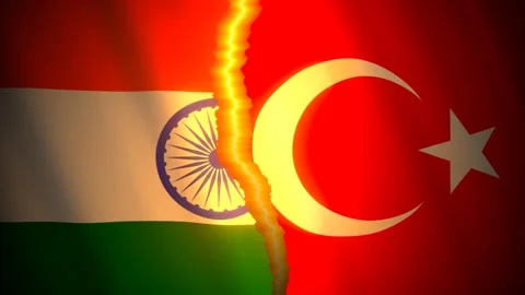 India and Turkey flags torn apart along a glowing rift Видео 346385681