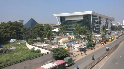 India Bangalore technology, contrast between corporate building and slum housing Stock-Footage 48768463