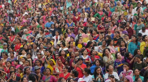 India crowds, women, female, colorful dress, traditional, border ceremony Stock Footage