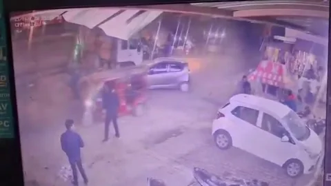 India: Drunk driving rampage sparks chaos as car rams multiple vehicles, ... Stock Footage 327442453