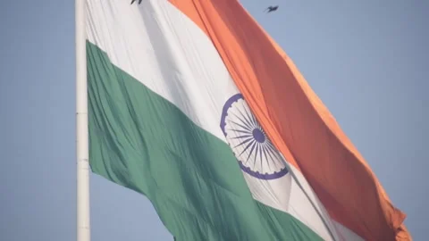 India flag flying high at Connaught Place with pride in blue sky, India fla.. Stock Footage 242255840