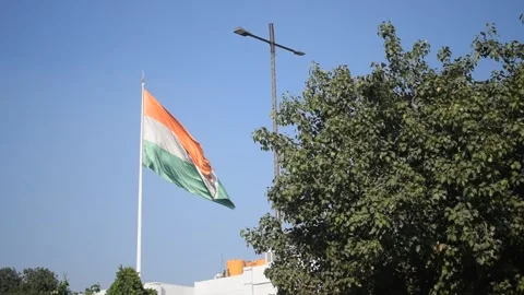 India flag flying high at Connaught Place with pride in blue sky, India fla.. Stock Footage 305621464