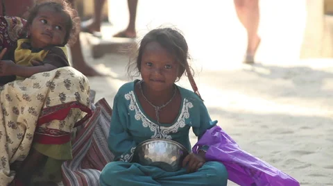 INDIA, GOA - 2012:  Indian caste Dalit untouchable female group begging Stock Footage 45592734