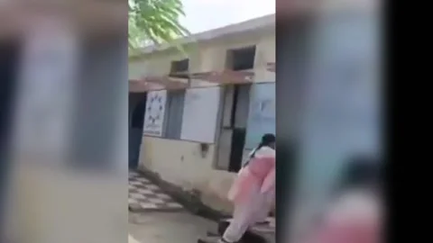 India: Heated brawl breaks out in school after female teacher accuses male t... Stock Footage 285629344