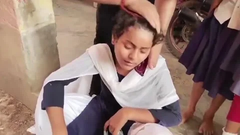 India: Heatwave leads to 60 students fainting, demand for school closure ris... Stock Footage 276525758