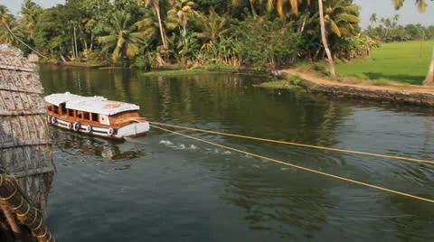 India Kerala backwater boat pulling drege c Stock Footage 24552244