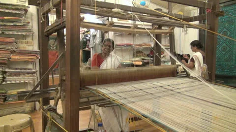 India Kerala woman weaving looks through strands  Stock Footage