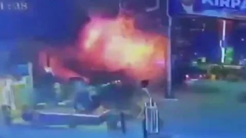 India: Massive panic erupts after sudden scooter explosion near army head... Stock Footage 334173664