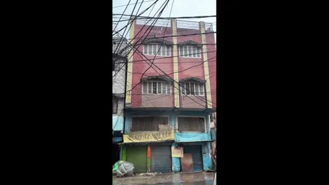 India: Multi-storey building collapses after days of heavy rain in Morada... Stock Footage 344972441