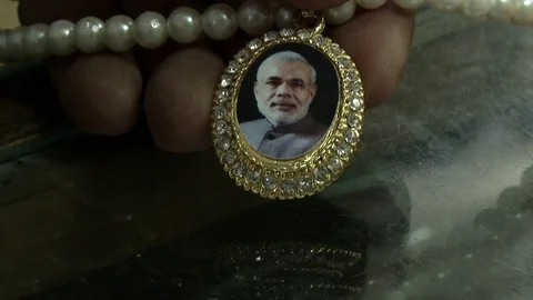 India, Narendra Modi gadgets inside BJP party propaganda shop headquarters Stock Footage 77085894