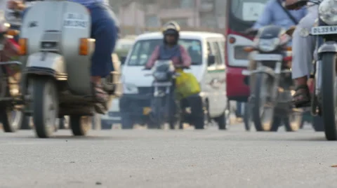 India, New Delhi, low angle video of traffic driving the streets Stock Footage 48773631