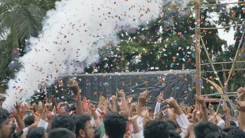 India,  Paper graffiti sprayed on the streets during Ganapathi idol immersion. Stock Footage 123336818