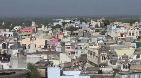 India Rajasthan Deogarh rooftops pale blue and magenta  Stock Footage 24455358